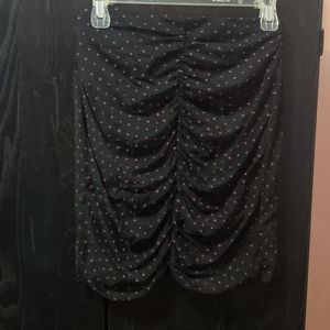 Black and pink polka-dot skirt